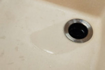 What to do if the garbage disposal in the sink is not working properly?