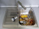 Organic waste from the kitchen in the sink with a waste disposer