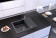 Dark granite sink in the kitchen